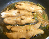 A picture of step 5 of Easy Simmered Flounder in a Frying Pan.