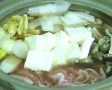 A picture of step 3 of Mizuna Greens, Pork, and Daikon Radish Harihari Hot Pot.