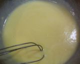 A picture of step 2 of Crisp and Fluffy Chocolate Doughnuts.