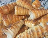 صورة لخطوة 4 من وصفة كورني بصلصة الفرماج الاحمر ❣😋