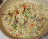 A picture of step 8 of Fish and Shrimp Potpie.