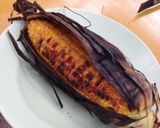 A picture of step 9 of BBQ Corn on the Cob with Husks.