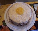A picture of step 7 of Pineapple filled toasted coconut yellow rum cake..