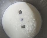 A picture of step 2 of Milkybar milk shake.