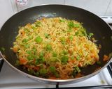 A picture of step 6 of Maggi stuffed jacket potatoes.