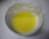 A picture of step 1 of Easy Crepes with Pancake Mix in a Frying Pan.
