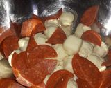 A picture of step 2 of Pepperoni tear and share bread.