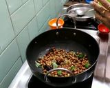 A picture of step 4 of Kaisasive chitranna / coconut mustard rice.