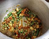 A picture of step 3 of Aloo Matar Pulav.