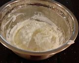 A picture of step 12 of Fresh Strawberry Chip Cake with Lemon Cream Frosting.