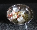 A picture of step 4 of Crab Stick and Artichoke Dip.