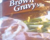 A picture of step 3 of Crockpot pork chops with brown gravy.