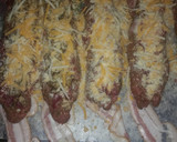 A picture of step 5 of Bacon cheeseburger roll up.