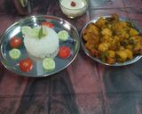 A picture of step 38 of Aloo fulcopi katla rosha ar misti doi.