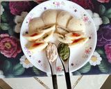 A picture of step 5 of , Chutney and tomato ketchup filled idli.