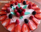 Foto del passaggio 4 della ricetta Cheesecake allo yogurt e frutti rossi