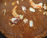 Foto del paso 11 de la receta: Arroz meloso de gambones y calamar al horno con All i Oli de ajo