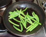 A picture of step 3 of Stir-Fried and Simmered Eggplants, Green Beans and Deep-fried Tofu.