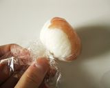 A picture of step 8 of Western Style Temarizushi (Ball Shaped Sushi) with Cured Ham and Cheese.
