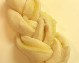 A picture of step 12 of Lemon and Almond Zopf (Braided Loaf).