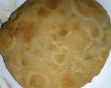 A picture of step 4 of Aalu ki tarkari with kachori.