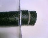 A picture of step 8 of Salmon and Avocado Fat Sushi Rolls (Futomaki).