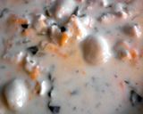 A picture of step 10 of Olive Gardens Chicken & Gnocci Soup.