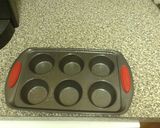 A picture of step 2 of Sausage Egg N Cheese Muffins Wifey Style.