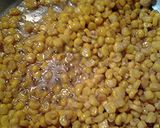 A picture of step 3 of Corn egg parmesaen cheese with chick peas.