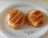 Foto del passaggio 3 della ricetta Tomini in pasta sfoglia con speck