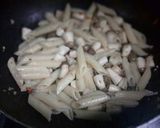 A picture of step 4 of Penne with Spicy Mushroom.