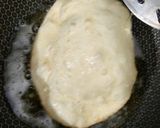 A picture of step 9 of Shahi Chhole Bhature prepared with garam masala.