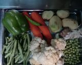 A picture of step 2 of Coconut Navratan Korma with vegetable Idlis.