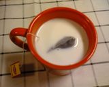 A picture of step 3 of Easy Rich Milk Tea in a Microwave.