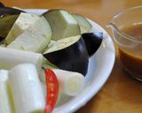 A picture of step 1 of Eggplant and Japanese Leek Stir-fry with Miso.