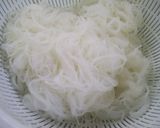 A picture of step 3 of Stir-fried Bifun Noodles with lots of Spring Cabbage and Sweet Onions.