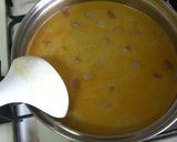 A picture of step 5 of Potato and Wiener Sausage Curry Soup.