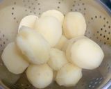 A picture of step 2 of My Garlic Buttered Smashed Roast Potatoes 🥔😍.