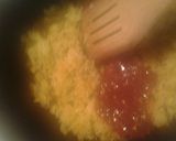 A picture of step 3 of Fried nuts and rice.