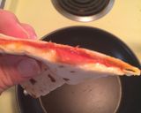 A picture of step 6 of Pizzadillas.