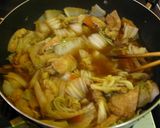 A picture of step 4 of Simmered Aburaage and Chinese Cabbage.