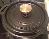 A picture of step 4 of Simmered Kabocha Squash in a Staub Cocotte.