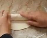 A picture of step 4 of Maggi Masala chicken Braided Bread Rolls.