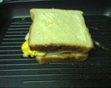 A picture of step 12 of Grilled Sausage Fried Egg And Cheese.