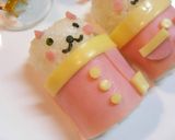 A picture of step 3 of Santa Barrel Cats Character Bento.
