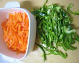 A picture of step 2 of Bell Pepper & Carrots with Sesame-Miso Dressing.