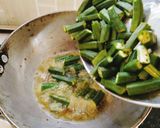 A picture of step 1 of Masaledar dahi (curd) bhindi.