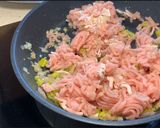 A picture of step 4 of Chicken Enchiladas with Pickled Peppers.