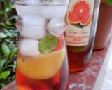 Une image de l'étape 3 de Cocktail sans alcool sirop de pamplemousse cerises citron menthe.
