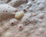 A picture of step 3 of Crisp ghee roast roti.